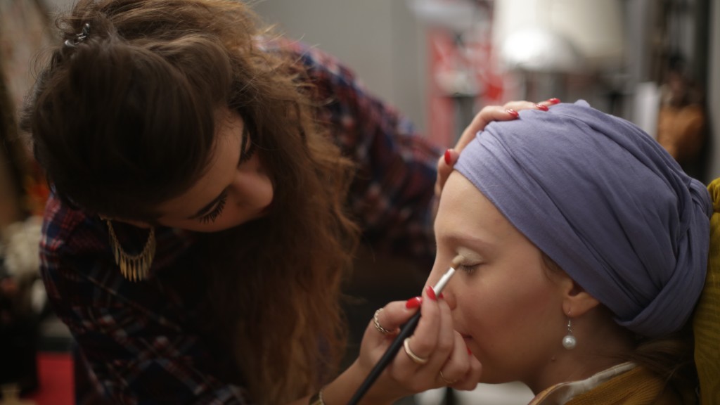 Preparazione della ragazza con l'orecchino di perla