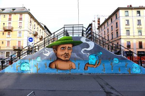 Ritratto su muro, ponte sui navigli. Sea Creative - street art